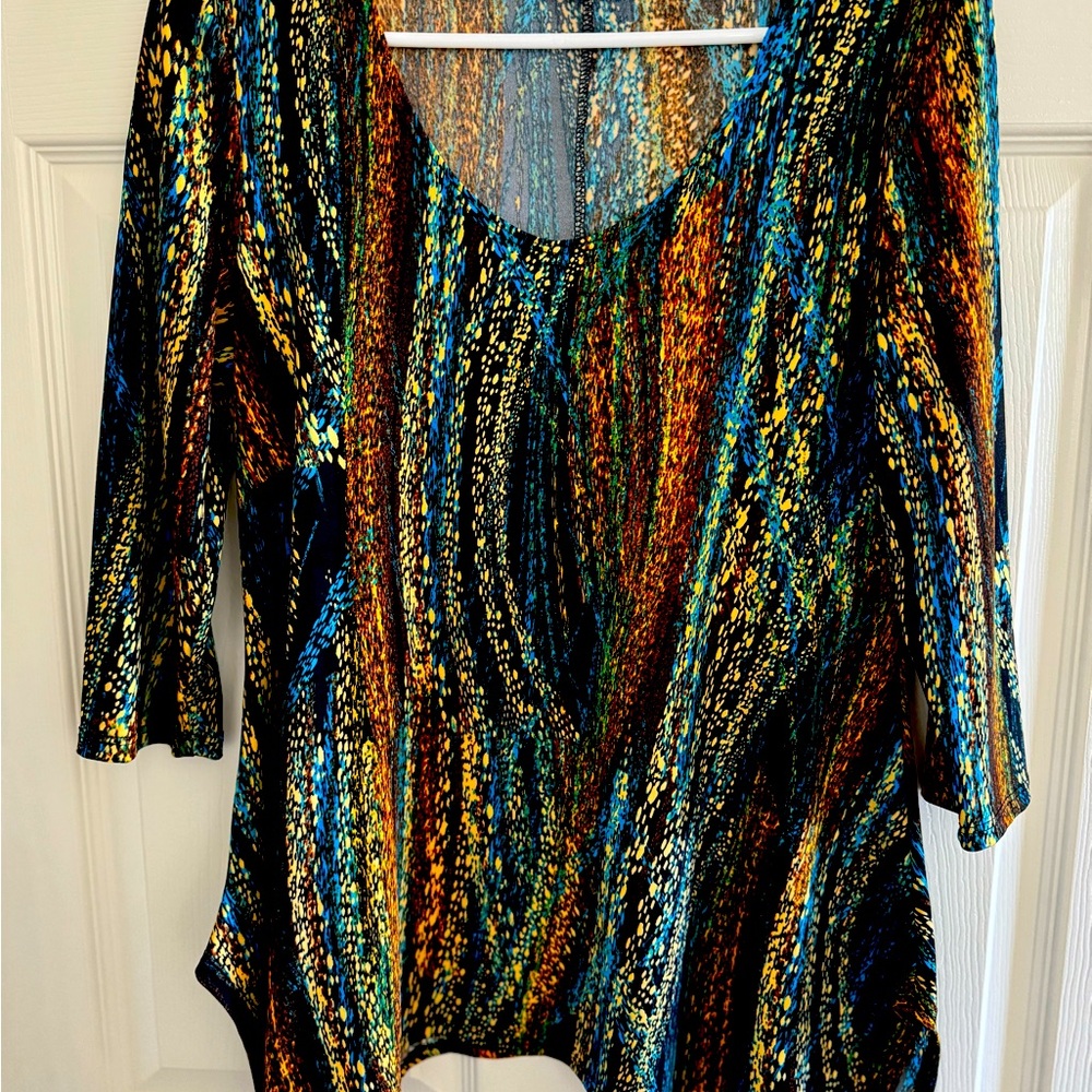 Linda Leal, multi colored top